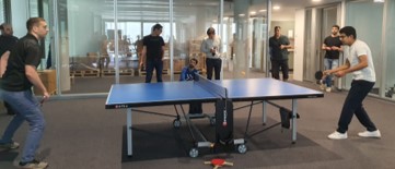 people playing table tennis